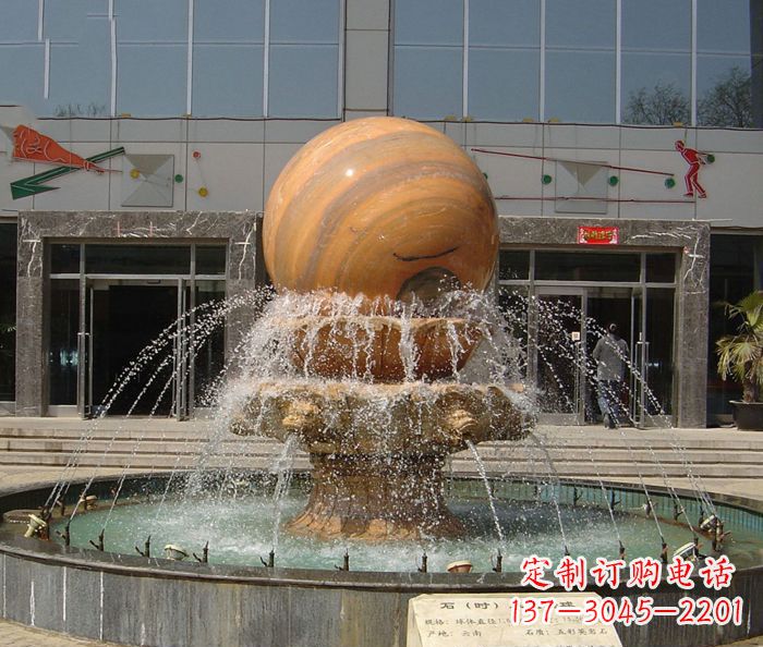 赣州石来运转球晚霞红风水球石雕